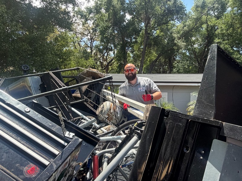 Junk Nation Removal trailer loaded with scrap metal and household debris
